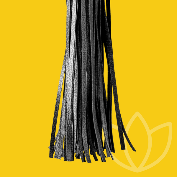 Hanging tassels of black flogger | Bodyjoys