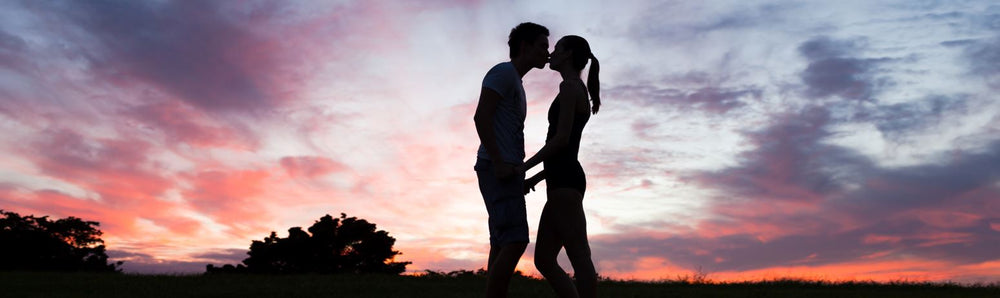 Sexual Wellness Offers | Couple Kissing During Sunset | Bodyjoys