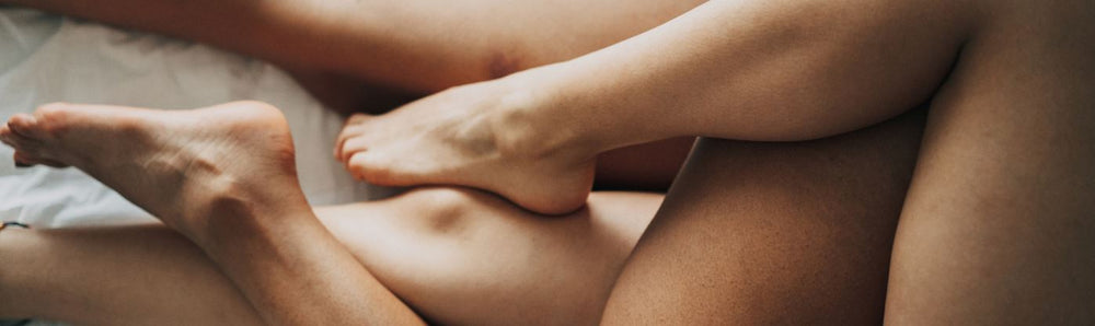 Sexual Wellness Guides for Couples | Intertwined Couples' Legs | Bodyjoys